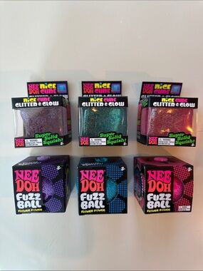 Needoh bundle of 6! 3 fuzzballs and 3 glitter and glow cubes- pink, purple, blue